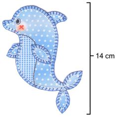 a blue fish with white dots on it's body is shown next to a ruler