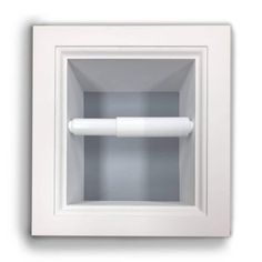 a white toilet paper dispenser mounted in a square frame with an opening