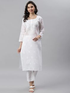 Festive Cotton Sets With Tonal Embroidery, Spring Straight Kurta With Tonal Embroidery, White Embroidered Fabric With Self Design, Spring Embroidered White Traditional Wear, White Self-design Kurta For Spring, Cotton Straight Kurta With Tonal Embroidery, Cotton Kurta With Tonal Embroidery, Eid Cotton Kurta With Tonal Embroidery, Spring White Salwar Kameez With Self Design