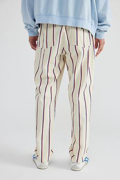 Striped woven chef pants by Cookman. Easygoing woven pants from Cookman feature a relaxed leg, drawstring waist and pockets at the front and back, in a striped pattern. Features Striped woven chef pant from Cookman Drawstring waist 2 front pocket; 2 back pocket Content + Care 65% Polyester, 35% cotton Machine wash Imported Size + Fit Model is 6’1" and wearing size Medium Measurements taken from size Medium Rise: 11" Inseam: 30" Leg opening: 7" | Cookman Striped Woven Chef Pant in Stripe French B Casual Pinstripe Pants With Relaxed Fit, Casual Pinstripe Relaxed Fit Pants, Casual Pinstripe Tapered Leg Bottoms, Chef Pants, Summer Essentials, Mens Bottom, Drawstring Waist, Front Pocket, Urban Outfitters