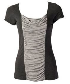 a women's t - shirt on a mannequin head with a black and grey top