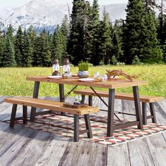 a picnic table with two benches on it