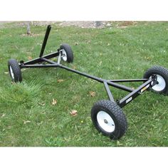 a cart with two wheels on the grass