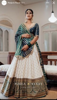 Golden Lehenga With Contrast Blouse, Marvadi Lehenga, Bright Colour Lehenga, Lengha Stitching Ideas, White Lehenga With Green Dupatta, White Multicolor Lehenga, Wedding Chaniya Choli Indian Fashion, Bandhej Lehenga Designs, Grah Shanti Outfit