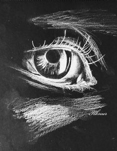 an eye is shown in black and white, with the iris partially closed to reveal light