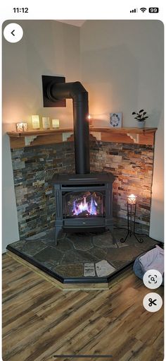 Fireplace Woodburner Ideas, Tile Wall Behind Pellet Stove, Wood Burning Stove In Corner Of Living Room, Gas Stove Fireplace Corner, Enclosed Porch With Wood Stove, Pallet Stove Ideas, Potbelly Stove Decor Living Rooms, Decorating Around Wood Stove, Free Standing Wood Burning Fireplace Ideas