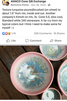 three bowls sitting on top of a wooden table next to each other with different designs