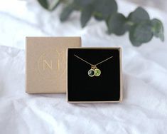 This gorgeous birthstone necklace makes a wonderful and long-lasting gift for someone special.D E T A I L S- available in 925 sterling silver or 24k gold plated- eco-friendly jewelry box with foiled pressed NJ Studio logo- no receipt included - gift-giving ready!- Swarovski birthstones- nickel freeMatching bracelet: https://www.etsy.com/uk/listing/797980583S I Z E∙ 16 in (40 cm)∙ 18 in (45 cm)P E R S O N A L I S A T I O N∙ ADD ON ∙ Initial disc ∙ www.etsy.com/uk/listing/774922298∙ ADD ON ∙ Jewel Birthstones Necklace, Necklace Family, Sister Necklace, Birthday Jewelry, Mum Birthday Gift, Family Necklace, Eco Friendly Jewelry, Gift For Mum, Studio Logo