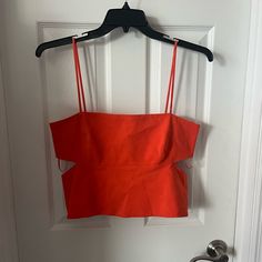 Nwt Super Cute Orange Cut Out Crop Tank From Zara. Size Xl, Would Recommend For A Large. Summer Cropped Tops With Cutout, Summer Cropped Cutout Tops, Spring Cutout Crop Top, Spring Sleeveless Crop Top With Cutout, Spring Sleeveless Cutout Crop Top, Sleeveless Cutout Beach Tops, Casual Spring Tank Top With Cutout, Spring Cutout Tank Top For Night Out, Cutout Tops For Summer Day Out