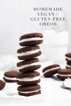 chocolate sandwich cookies stacked on top of each other with white frosting in between them