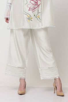 White kurta with floral thread embroidery embellished by pearl and scalloped lace. Comes with pant. - Aza Fashions Cotton V-neck Sets With Resham Embroidery, Elegant Spring Palazzo Set With Resham Embroidery, Elegant Spring Resham Embroidery Palazzo Set, Elegant Floral Embroidery Pant Set With Straight Pants, Elegant Pant Set With Floral Embroidery, Elegant Chikankari Embroidery Palazzo Set For Spring, Elegant Spring Palazzo Set With Chikankari Embroidery, Cotton Floral Embroidered V-neck Sets, Elegant Floral Embroidered Palazzo Set