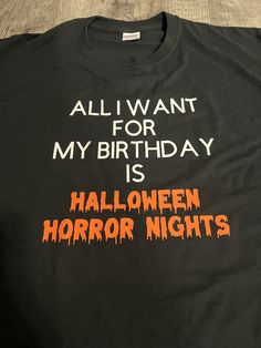 This custom made to order shirt is inspired by Halloween Horror Nights and perfect for any horror nights fan!  The lettering and shirt can be different colors just send me a message and we can discuss.  This custom shirt comes from a smoke and pet free home. Black T-shirt For Halloween And Fan Conventions, Black T-shirt For Halloween Fan Conventions, Black T-shirt With Letter Print For Costume Party, Customizable Fun Black T-shirt, Themed Black T-shirt With Letter Print, Themed Black T-shirt Gift, Black T-shirt For Halloween Birthday, Funny Black Customizable T-shirt, Black Band Merch T-shirt For Birthday