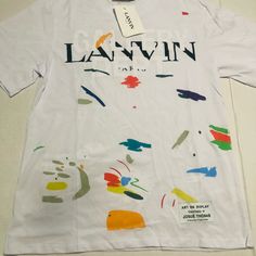 Gallery Dept. Lanvin T-Shirt Paint Splatter Design Size Mens Small With Tags Casual Short Sleeve Tops With Paint Splatter, Spring Short Sleeve Tops With Paint Splatter, Paint Splattered Cotton Crew Neck Tops, Casual Short Sleeve Paint Splatter Top, Summer White Paint Splatter Tops, Spring Paint Splatter Short Sleeve Tops, Graphic Tee With Paint Splatter And Crew Neck, Paint Splatter Graphic Tee With Crew Neck, White Paint Splatter Tops For Streetwear