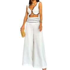 This casual short vest pant suit is the perfect addition to your wardrobe. Made with comfortable and versatile material, it can easily be dressed up or down for any occasion. The vest adds a touch of sophistication while the pants offer all-day comfort. A must-have for any fashion-forward individual. Chic Solid Two-piece Pant Set, Elegant Two-piece Summer Pants Set, Elegant Summer Two-piece Pants Set, Elegant Sleeveless Beachwear Sets, Elegant Two-piece Beach Set, Chic Solid Color Two-piece Set For Summer, Chic Solid Two-piece Set For Summer, Elegant Two-piece Pant Set For Summer, Elegant Two-piece Summer Bottoms Set