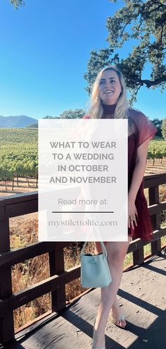 a woman standing on a bridge with the words what to wear to a wedding in october and november