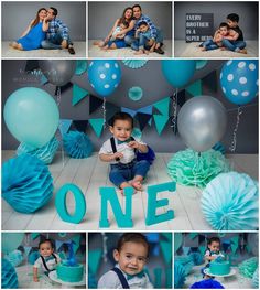 a baby boy sitting on the floor in front of blue and white decorations with balloons