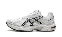 The ASICS Gel-1130 “Black/White” is another standout colorway of the retro performance running shoe.  The ASICS Gel-1130 was first released in 2008 and is now one of the most popular sneakers in the Y2K trend in sneaker culture.  On this colorway, the upper features a white mesh construction with tonal and light grey leather overlays.  ASICS’s classic tiger stripes are designed in white and accented in black  on either side of the shoe.  “ASICS” and “Gel-1130” branding are seen on the mesh tongu Asics Dynamic Sneakers For Light Sports, Asics Running Shoes With Vented Sides For Light Sports, Dynamic Asics Sneakers For Light Sports, Asics Running Shoes With Vented Sides For Streetwear, Asics Breathable Sneakers For Marathon, Asics Sporty Running Shoes With Vented Sides, Sporty Asics Running Shoes With Vented Sides, Asics Running Shoes With Cushioned Midsole For Streetwear, Classic Sports Sneakers With Vented Sides