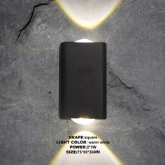 an image of a wall light that is on the side of a stone wall with text underneath it