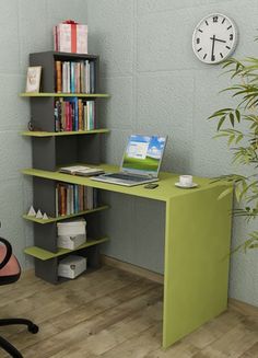 a computer desk with a laptop and bookshelf in front of a clock on the wall