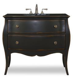 an antique style vanity with two drawers and a faucet on the top shelf