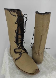 This is handmade genuine leather men's boots. 10.5 us men 44 Eu men. For other size please contact with us. Made with natural leather. On boots there is little stains. There is flat leather sole. Very comfy and usefull. We have door to door express shipping service. Handmade. Natural. Handstitched. İf you have any questions please contact with us. bemyboots.etsy.com Thank you Western Style Leather Lace-up Boots For Outdoor, Western Leather Lace-up Boots For Outdoor, Leather Sole Lace-up Boots For Festival, Medieval Brown Boots With Leather Sole, Lace-up Boots With Leather Sole For Festival, Festival Lace-up Boots With Leather Sole, Traditional Leather Boots With Rubber Sole, Leather Festival Boots With Snip Toe, Traditional Lace-up Boots With Rubber Sole