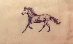 a drawing of a running horse on the side of a white sheet with black ink