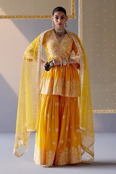 Mango yellow peplum top with thread and mirror ambi embroidery all over. Paired with an embroidered sharara and dupatta. - Aza Fashions Peplum Top Outfits, Indian Closet, Embroidered Sharara, Mango Yellow, Haldi Outfits, Haldi Outfit, Sharara Set, Stylish Dress Book, Manish