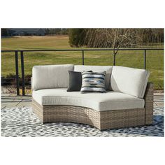 This cool, casual outdoor loveseat will raise the comfort level and visual appeal of your outdoor living space. Made of handwoven wicker in easy-going beige tones, the curved loveseat blends beautifully into your lanai or pool and patio area with thick, comfy cushions wrapped in Nuvella® high performance fabric that is stain resistant, fade resistant and easy to clean. The cushioned loveseat can be used on its own or paired with other pieces of the matching sectional to create a space that holds Curved Loveseat, Beige Loveseat, Pool And Patio, Casual Dining Rooms, Casual Seating, Outdoor Loveseat, Beige Tones, Luxury Loft, Outdoor Living Areas