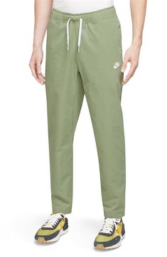 Sporty and comfortable, these lightweight pants topped with a drawstring waist feature handy pockets and a fit that tapers to stay close and out of your way. 100% polyester Machine wash, dry flat Imported Casual Green Sweatpants With Elastic Side Panels, Casual Green Pants With Elastic Side Panels, Casual Sports Pants With Functional Drawstring, Spring Sweatpants With Functional Drawstring And Relaxed Fit, Athleisure Drawstring Ankle-length Pants, Athleisure Ankle-length Drawstring Pants, Spring Leisure Joggers With Drawstring, Relaxed Fit Spring Joggers With Straight Hem, Spring Green Joggers With Side Pockets