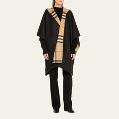 Burberry "Catherine" hooded check cape in cashmere  Approx. 87"L x 52.8"W Side vents Slip pockets Hem rests below the hips  Made in Italy Luxury Cape For Fall, Designer Plaid Outerwear For Winter, Luxury Winter Poncho, Cashmere Cape, Burberry, Cape, Top Brands, Tops Designs, Cashmere