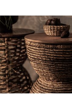 two wicker baskets sitting on top of each other