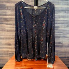 Nwt. Bell Sleeve Peasant Blouse. Size Xl. Navy Blue With Multicolored Pattern. Lace Detailing On Front And Sleeves. Blue Tunic Tops For Fall, Blue Long Sleeve Blouse With Boho Print, Fall Boho Print Peasant Tunic Top, Long Sleeve Rayon Peasant Top With Floral Print, Flowy Tunic Peasant Top For Fall, Blue Boho Print Top For Fall, Blue Boho Print Tops For Fall, Patterned Long Sleeve Rayon Blouse, Patterned Long Sleeve Peasant Blouse