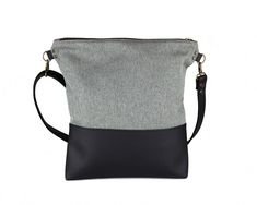 "SAVE 15% ON YOUR NEXT PURCHASE BY SIGNING UP AT bit.ly/signup-maiook The Wren is a medium-sized cross body bag with handmade origami detail made from gray polyester fabric and black vegan leather bottom. This gray shoulder handbag is large enough to store your cosmetics, tablet, phone, wallet, appointment book and keys. + MATERIAL + ------------------- ▸exterior: polyester fabric + vegan leather ▸lining: black cotton fabric + DETAILS + ----------------- ▸hand smocked origami detail on the front Minimal Bags, Crossover Purse, Women Sling Bag, Origami Bag, Boho Crossbody Bag, Grey Crossbody Bag, Casual Purse, Black Cotton Fabric, Everyday Purse