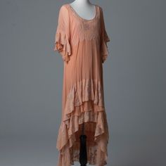 Never Worn Hi Low Dress From Free People. Size Small. Peachy Color. Lots Of Beautiful Detail. These Dresses Were Used In A Photography Studio Wardrobe. Most Have Never Been Worn. More Photos Can Be Taken Upon Request. Thank You For Looking! Bohemian Pink Lace Dress, Bohemian Peach Dress With Ruffles, Peach Lace Trim Dress For Summer, Pink Short Sleeve Maxi Dress With Lace Trim, Peach Dresses With Floral Embroidery, Pink Short Sleeve Maxi Dress With Floral Embroidery, Pink Embroidered Short Sleeve Maxi Dress, Spring Bohemian Peach Maxi Dress, Spring Apricot Dress With Lace Trim