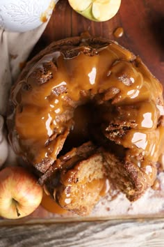 an apple cake with caramel drizzled on top