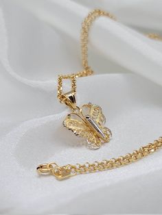 18K(750) Solid Gold Butterfly Charm Necklace. A Unique Version Design Of Butterfly Pendant, Really Shiny! A Perfect Gift For All Occasions! ALL MY JWELERIES ARE MADE OF HIGH QUALITY SOLID/REAL GOLD MATERIAL ONLY AND I DO NOT CARRY ANY '' GOLD PLATED OR GOLD FILLED MATERIAL'' ITEMS. Total weight: 3.91g (Chain & Pendant) Chain Length: 18 inches  Chain Width: 2mm The Pendant is available for sale individually. Please message me for more details! Pendant Weight: 1.71gr Pendant Height: 20mm Pendant Width: 18mm  * 18K Solid Gold 18k solid gold pieces are made to last forever. Solid 18K gold jewelry is the most expensive and high quality option as it doesn't rub off or flake, and doesn't tarnish. Solid gold actually increases in value over time, and has the best resale value. 18K gold is richer a Diamond Figaro Chain Jewelry As Gift, Diamond Filigree Necklace Gift, White Gold Diamond Cut Chain Necklace Gift, White Gold Figaro Chain Necklace As Gift, Gold Pendant Chain Necklace With Diamond Cut, Necklace For Her, Butterfly Pendant Necklace, 18k Gold Jewelry, Precious Jewels