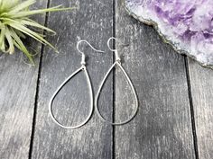 "These super lightweight teardrop hoop earrings feature 40mm x 26mm brass open teardrops. Choose silver-plated or gold-plated! These minimalist geometric earrings will complement any outfit, and are lightweight enough for all day wear! The earrings measure 2.5 inches from the bottom of the teardrop to the top of the ear wires. The gold earrings have hypoallergenic gold-plated surgical steel ear wires, while the silver earrings have hypoallergenic surgical steel ear wires. These earrings are incr Metal Teardrop Drop Earrings As Gift, Everyday Metal Teardrop Earrings, Hypoallergenic Metal Drop Teardrop Earrings, Hypoallergenic Metal Teardrop Drop Earrings, Hypoallergenic Metal Teardrop Earrings, Metal Teardrop Hoop Earrings For Pierced Ears, Everyday Metal Teardrop Drop Earrings, Everyday Pierced Teardrop Pendant Earrings, Everyday Teardrop Pendant Pierced Earrings