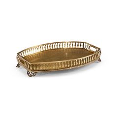 a golden metal tray with intricate designs on the bottom and sides, set against a white background