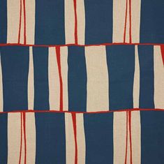 a blue and white striped fabric with red stripes