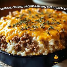 Warm, comforting, and cheesy, this Cheddar-Crusted Ground Beef and Rice Casserole is a family favorite that's easy to whip up! 

Ingredients: 
- 1 lb ground beef 
- 1 cup cooked rice 
- 1 cup shredded cheddar cheese 
- 1/2 cup sour cream 
- 1/2 cup tomato sauce 
- 1 small onion, diced 

Directions: 
1. Preheat your oven to 350°F (175°C). 
2. In a skillet over medium heat, brown the ground beef with the diced onion until the beef is cooked through and the onion is soft. Drain excess fat. 
3. I...