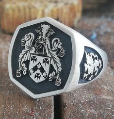 "Your custom solid sterling Silver ring will be made on your order, customize this Coat of Arms and your logo on this collection! A beautiful symbol that will fit your hands and style. perfect gift for anniversary, special dates and any date you can imagine can be Personalized. Different colors are silver, gold, rose gold. White gold and 24K gold options will never tarnish and last decades. Please contact me if you are interested in my jewelry. >ABOUT ME: I have 35 years of experience in making custom handmade silver and gold jewelry, including custom engraved Signet rings My childhood kind of allowed me to live among precious metals and gems pretty much I opened my workshop back in 1986 Never got bored of making Personalized gifts, birth flower rings, engagement rings with real diamonds F Pinky Signet Ring Family Crest, Luxury Signet Ring With Coat Of Arms, Luxury Heirloom Signet Ring With Coat Of Arms, Heirloom Rings With Engraving For Commemoration, Custom Oval Hallmarked Signet Ring, Sterling Silver Signet Ring With Engraving For Commemoration, Black Sterling Silver Signet Ring With Engraving Option, Custom Hallmarked Signet Ring For Anniversary, Custom Handmade Signet Ring As Gift