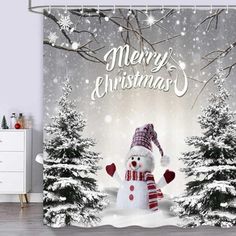 a christmas themed shower curtain with a snowman in the middle and trees behind it