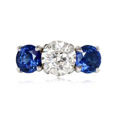 three stone diamond and blue sapphire ring