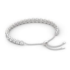 Create a sensation with this fashion-forward tennis bracelet. This graceful look features a fluid line of sparkling round stones. This classic, elegant and timeless look blends sophistication with radiance and sparkle. Crafted in high-polished sterling silver, this bracelet is sure to add a touch of elegance and style to any outfit, from business casual to formal wear.Carat Weight: 5.9 ctStone Size: 3.5 mmNumber of Stones: 20 Stone Shape: RoundStone Color: Diamond WhiteWeight: 7.92 gWidth: 6 mmH Always In My Heart, Mens Fashion Casual Outfits, Bracelet Online, Contemporary Jewelry, Sterling Silver Bracelet, Style Gift, Tennis Bracelet, Bracelet Sizes, Watch Design