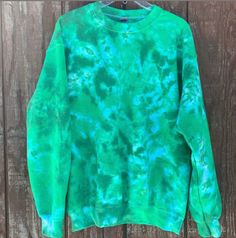 Green Tie Dye Sweatshirt // Adult or Kids Sweatshirts // St Patrick's Day Swirl Tie Dye Sweatshirt // St Paddy's Day Sweatshirt // Green Tie Dye // St. Patrick's Day Tie Dye // Kids St Patricks Day Tie Dye  Tie-Dye makes everyone happy :) How perfect is our Green Tie Dye Swirl sweatshirt. Just Perfect for St Patrick's or any other day of the year.  Made to Order - There will be slight variations in design.  Sweatshirts are 50% cotton, 50% poly. Youth hoodies do not have a drawstring.  Wash & Car Green Relaxed Fit Crew Neck Hoodie, Kids St Patricks Day, Swirl Tie Dye, Green Tie Dye, St. Patricks Day, Dye Sweatshirt, St Paddys Day, Green Tie, St Paddy