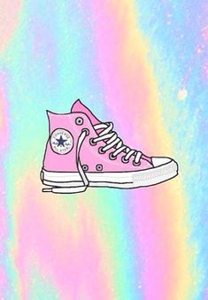 a pair of pink converse shoes floating in the air on a colorful background with pastel colors