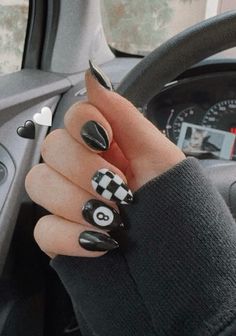 black nails with race car checkered and 8-ball accent nails #nails #nailart #naildesign #blackandwhite #blacknails #almondnails #gelnails #checkerednails #vegasnails #trendynails #y2k #edgy #concertoutfit #vegasoutfit #nailartideas #gel Black Trendy Nails, Black And White Checkered Nails, Skater Nails, Half And Half Nails, 8ball Nails, F1 Nails, Gemini Nails, Car Nails, Nessa Nails