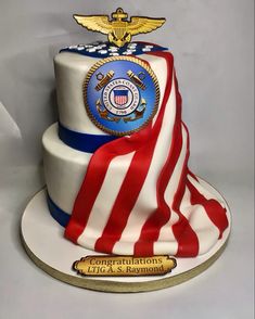 a cake decorated with an american flag and the seal of the united states on top