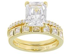 Bella Luce® 3.80ctw 9x7mm Rectangular Octagonal Shape With 1.3mm 0.26ctw Round White Diamond Simulants And 0.74ctw Square Shape White Diamond Simulants Eterno® 18k Yellow Gold Over Sterling Silver Band Ring Measures Approximately 0.83"L x 0.37"W, Shank 0.07"W, Band Measures 0.81"L x 0.13"W, Shank 0.09"W. Not sizable. The Diamond Equivalent Weight is 3.32ctw. Gold Square Cut Gia Certified Ring, Gia Certified Square Cut Gold Ring, Ring With Band, Sterling Silver Rings Bands, Jtv Jewelry, Diamond Simulant, Sterling Silver Bands, Square Shape, Silver Band