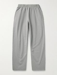 Balenciaga's sweatpants are made from heavyweight loopback cotton-jersey and cut for a slouchy, wide-leg fit. The all-over distressing, especially along the hem, gives them the look and feel of a longtime favourite. Singer Dr, Balenciaga Clothing, Sweatpants For Men, Gray Sweatpants, Baggy Sweatpants, Wardrobe Edit, Grey Sweatpants, Running Pants, Fine Jewelry Designers